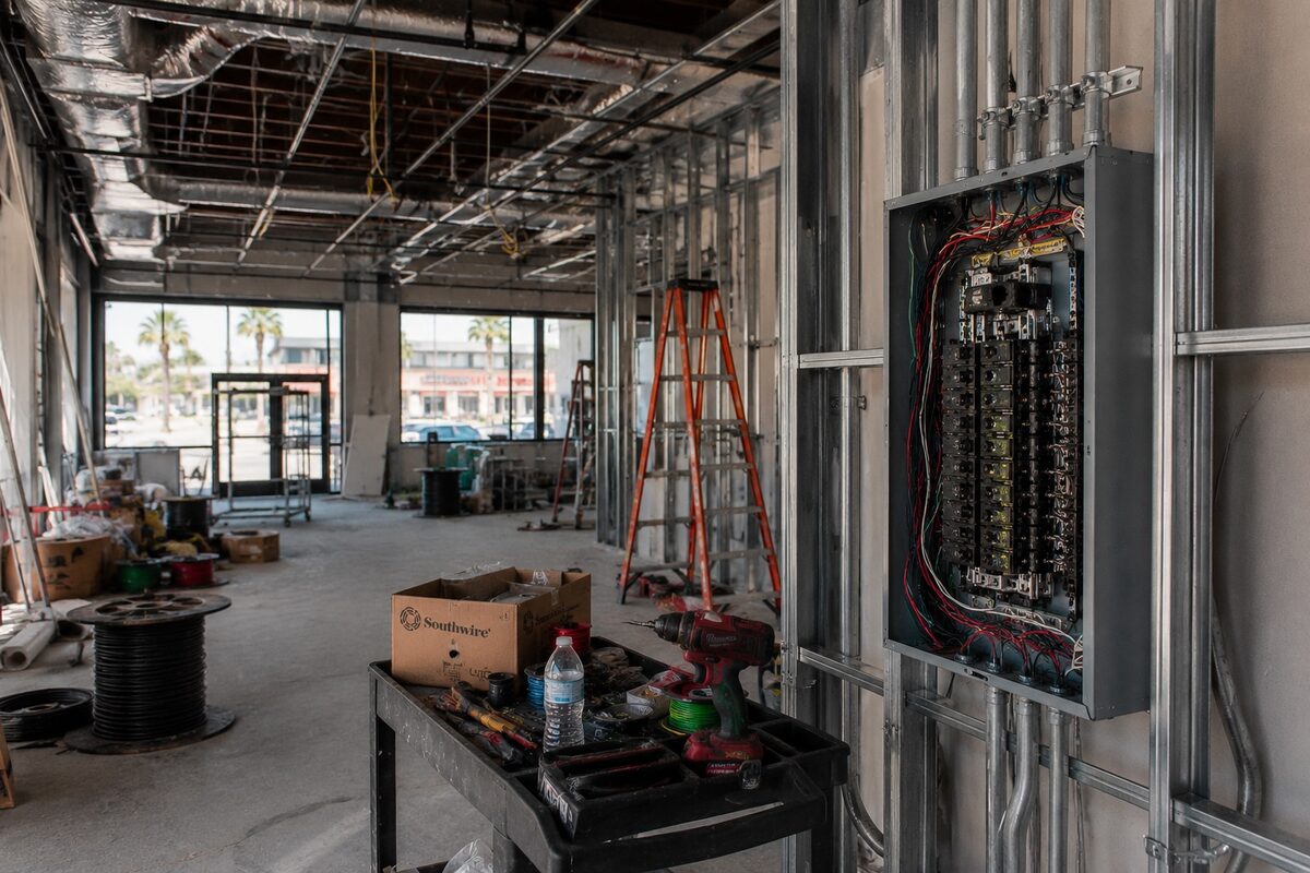 Commercial electrical panel installation on a tenant improvement job site